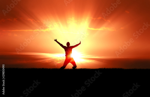 Photo: Man Jumping in Sun Rays Man Jumping in Sun Rays