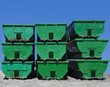 Green Containers used to transport recyclable materials Green Containers used to transport recyclable materials