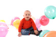 Playful boy with balloons