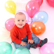 Baby with balloons