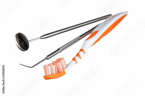 Photo: toothbrush and dental Instruments toothbrush and dental Instruments