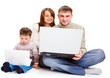 Parents  and toddler  with laptops