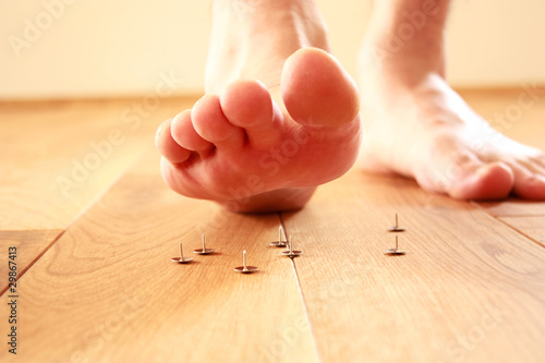 Photo: Foot stepping on tack Foot stepping on tack