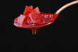 Jam from a quince in the spoon.