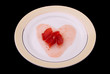 Jam as heart on a plate