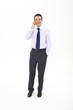 Smiling businessman on the phone
