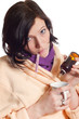 Closeup of young sick woman with drops and thermometer