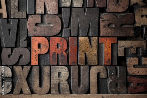 Photo: The word 'PRINT' spelled out in very old letterpress blocks. The word 'PRINT' spelled out in very old letterpress blocks.