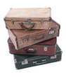 Four old Russian suitcases on a white background