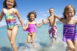 Kids playing at the Beach Kids playing at the Beach