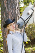Young woman with her horse