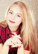 bright picture of lovely blond woman in checkered shirt