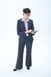 Businesswoman using pocket calculator