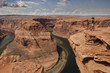Woman look the Colorado river front of Horseshoe Bend in Arizona