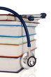 books and stethoscope isolated on white books and stethoscope isolated on white