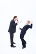 Manager shouting at businessman with megaphone