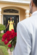 Romantic African American Man Bringing Flowers to Wife