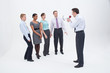 Photo: Manager shouting at businesspeople with megaphone Manager shouting at businesspeople with megaphone