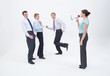 Photo: Female manager talking to businessmen with megaphone Female manager talking to businessmen with megaphone