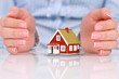 Hands and house.