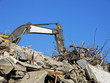 Foto: Abrissbagger bei der Arbeit Abrissbagger bei der Arbeit