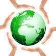 Hands making a circle with green Earth