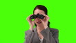 Woman looking through binoculars