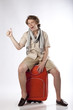 Photo: Young tourist hitchiking Young tourist hitchiking