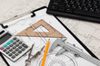construction drafts and tools on the table
