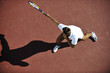 young man play tennis