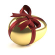 Illustration: golden easter egg with red ribbon golden easter egg with red ribbon