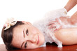 Young woman having  massage in hamam.