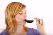 beautiful young woman enjoying wine