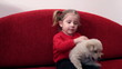 little girl with puppy pet