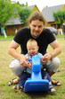 Father and son playing