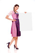 Young girl with dirndl dress holding billboard