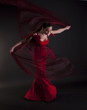 woman dancer posing with red veil