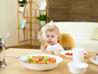 Photo: little boy having meal little boy having meal