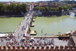 Tourists going on Sant' Angelo Bridge at summer day in Rome Tourists going on Sant' Angelo Bridge at summer day in Rome