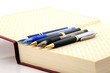 pens and book