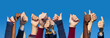 Multiracial Thumbs Up Against Blue Sky