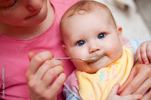 Photo: Mother feeding baby Mother feeding baby