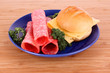 Sandwich on wooden plate