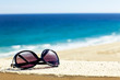 Foto: sunglasses at beachfront sunglasses at beachfront