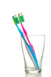 two toothbrushes in the glass isolated
