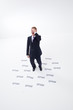 Businessman surrounded by spam