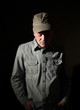 Military man with hands in pocket