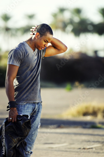 Photo: Young man with head down Young man with head down