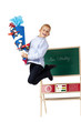 Schuljunge mit Schultüte macht am 1. Schultag Freudensprung