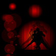 Dancing pair on red-black background